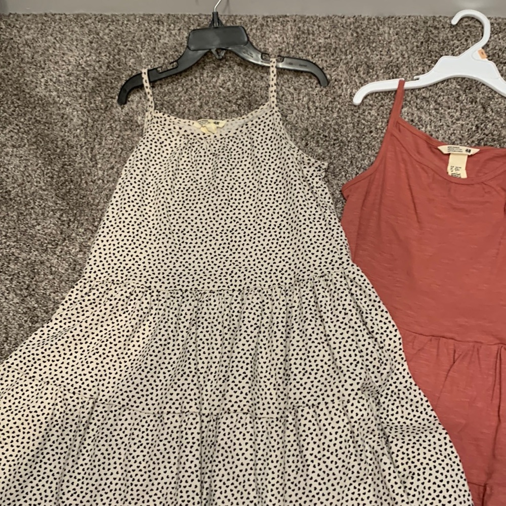 Two midi length dresses